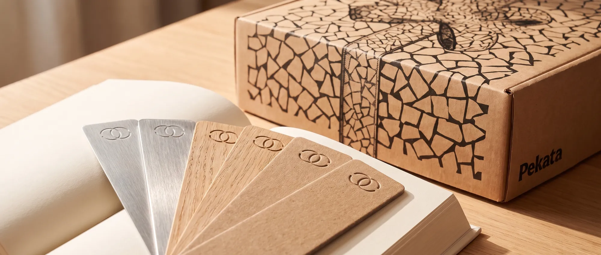 Printed bookmarks in card, wood and metal with a company logo